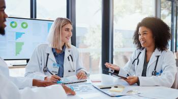 Doctors reviewing data