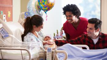 Happy family with newborn