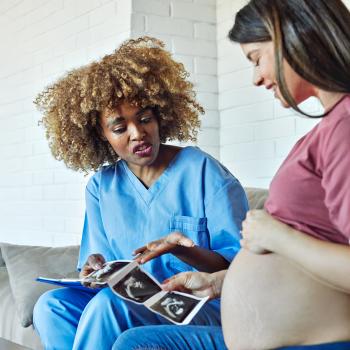 woman pregnant mother pregnancy belly patient nurse visit control exam ultrasound scan photo test maternity visit holding showing relaxation picture appointment