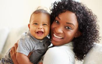Smiling mom and child