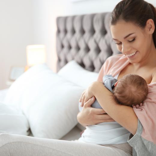 Smiling mother and infant